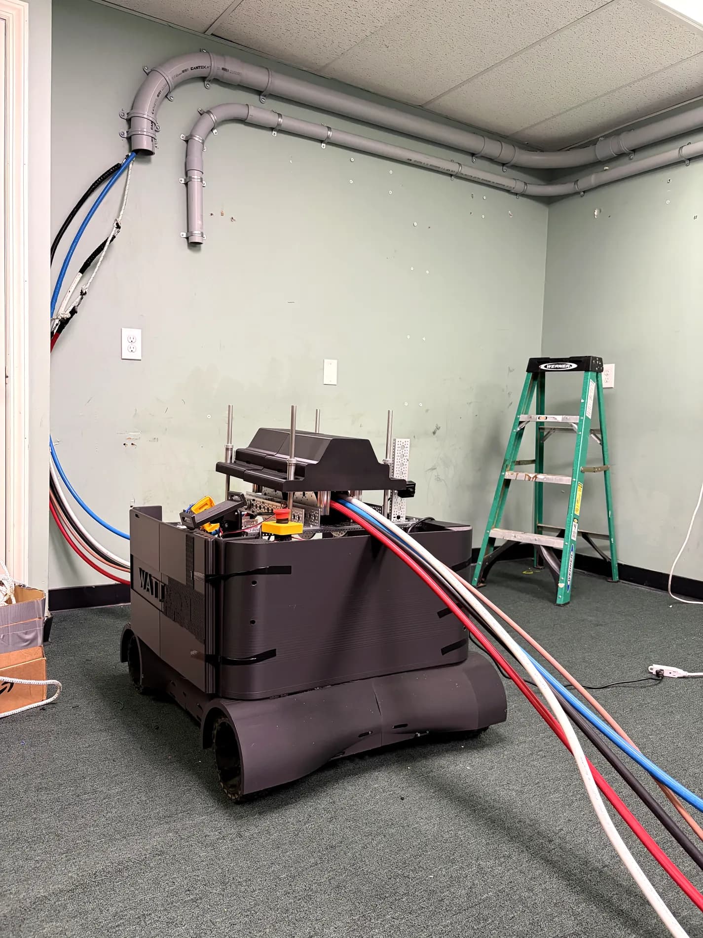 Wattson — two-robot wire-pulling system pulling cable on site